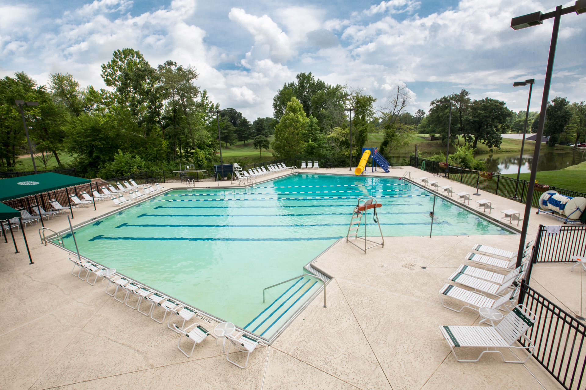 Outdoor-pool-with-lane-lines-and-slide-St_-Clair-Country-Club
